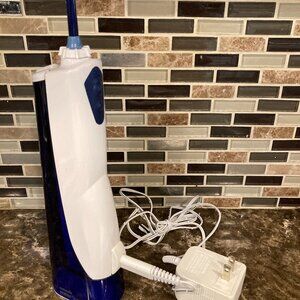 WaterPik Model WP-360/365, cordless, rechargeable, home or travel